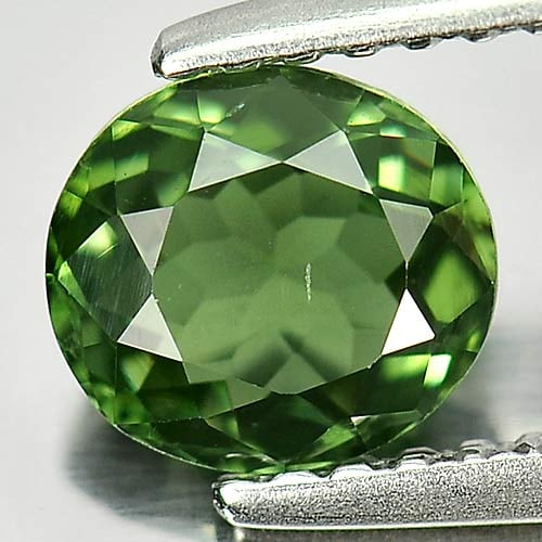 Natural Green Tourmaline Gemstones 0.81 Ct. Oval Shape 6.3 x 5.7 Mm.: Product ID: 807246276 Product Name: Natural Tourmaline Weight: 0.81 CT. Size: 6.3 x 5.7 x 3.2 MM. Shape: Oval Color: Green Clarity:VSI Luster: Good Gems Origin: Nigeria Treatment: Unheated Crystal Str