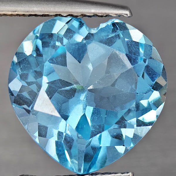 Natural Baby Blue Topaz Gemstones 5.36 Ct. Heart Shape 11 Mm: Product ID: 807168727 Product Name: Natural Blue Topaz Weight: 5.36 CT. Size: 11 x 11 x 6.7 MM. Shape: Heart Shape Color: Baby Blue Clarity:VSI Luster: Good Gems Origin: Brazil Treatment: Treated Crys