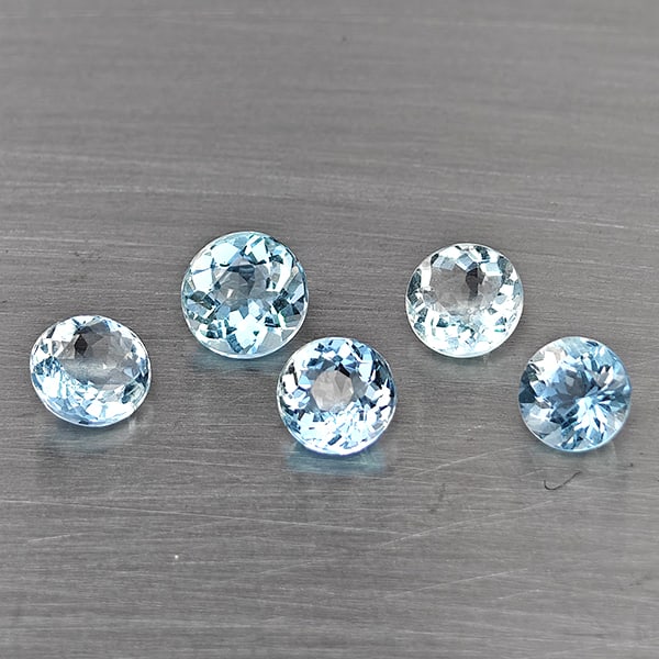 Natural Baby Blue Aquamarine Gemstones 1.75 Ct. 5 Pcs. Round Shape and Mixed Size: Product ID: 800812474 Product Name: Natural Aquamarine Weight: 1.75 CT. Size: 5 x 5 x 3.1 to 4.7 x 4.7 x 3 MM. Shape: Round Shape Color: Baby Blue Clarity:SI1 Luster: Good Gems Origin: Brazil Treatmen