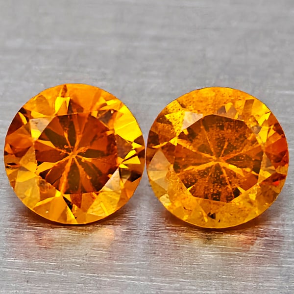 Natural Orange Songea Sapphire Gemstones 0.34 Ct. 2 Pcs. Round Diamond Cut 3.2 Mm.: Product ID: 806162890 Product Name: Natural Orange Sapphire Weight: 0.34 CT. Size: 3.2 x 3.2 x 2.2 MM. Shape: Round Diamond Cut Color: Orange Clarity:VSI Luster: Good Gems Origin: Tanzania Treatment: 