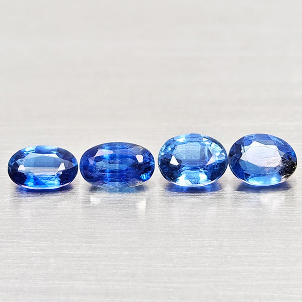 Natural Blue Kyanite Gemstones 1.32 Ct. 4 Pcs. Oval Shape and Mixed Size: Product ID: 804204840 Product Name: Natural Kyanite Weight: 2.10 CT. Size: 5.1 x 3.2 x 2.5 to 4.8 x 3.9 x 2.4 MM. Shape: Oval Color: Blue Clarity:VSI - SI1 Luster: Good Gems Origin: Sri - Lanka Treatm