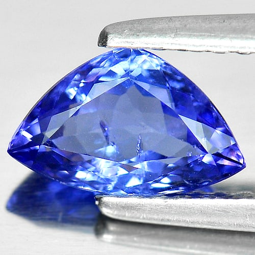 Natural Violet Blue Tanzanite Gemstones 1.07 Ct. Trilliant Shape 8.3 x 5.3 Mm.: Product ID: 807005374 Product Name: Natural Tanzanite Weight: 1.07 CT. Size: 8.3 x 5.3 x 3.4 MM. Shape: Trilliant Color: Blue Clarity:SI Luster: Good Gems Origin: Tanzania Treatment: Heated Crystal St