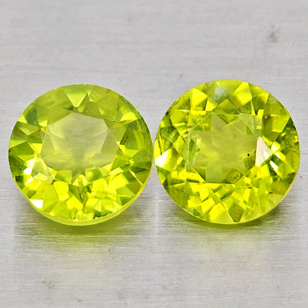 Natural Green Peridot Gemstones 1.79 Ct. 2 Pcs. Round Shape 6 Mm.: Product ID: 805317475 Product Name: Natural Rhodolite Weight: 1.79 CT. Size: 6 x 6 x 3.8 MM. Shape: Round Color: Green Clarity:VSI Luster: Good Gems Origin: Pakistan Treatment: Unheated Crystal Struct