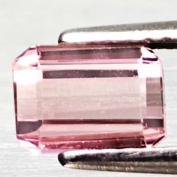 Natural Pink Tourmaline Gemstones 1.26 Ct. Octagon Shape 6.6 x 4.9 Mm.: Product ID: 807247386 Product Name: Natural Tourmaline Weight: 1.26 CT. Size: 6.6 x 4.9 x 3.9 MM. Shape: Octagon Color: Pink Clarity:VSI Luster: Good Gems Origin: Nigeria Treatment: Unheated Crystal S