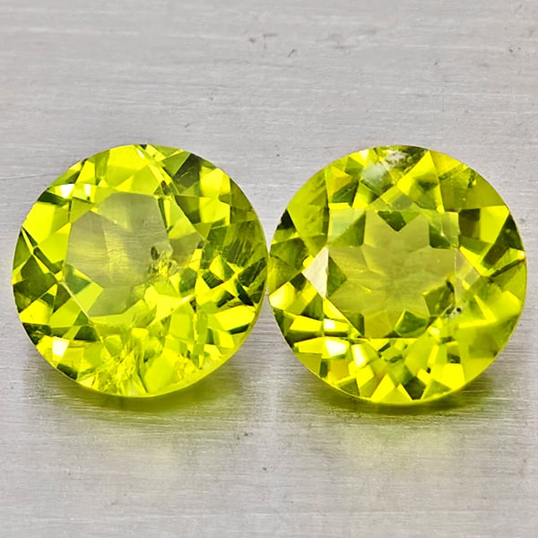Natural Green Peridot Gemstones 1.75 Ct. 2 Pcs. Round Shape 6 Mm.: Product ID: 805317449 Product Name: Natural Rhodolite Weight: 1.75 CT. Size: 6 x 6 x 3.5 MM. Shape: Round Color: Green Clarity:VSI Luster: Good Gems Origin: Pakistan Treatment: Unheated Crystal Struct