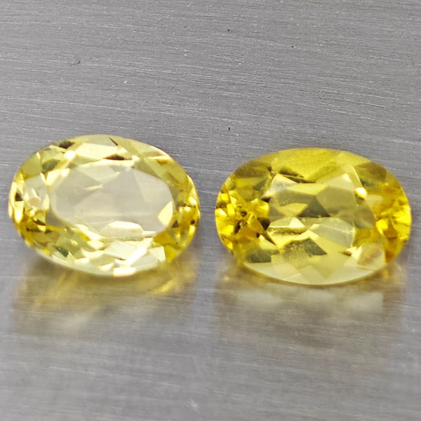 Natural Yellow Beryl Gemstones 1.50 Ct. 2 Pcs. Oval Shape 7.2 x 5.3 Mm.: Product ID: 801102745 Product Name: Natural Beryl Weight: 1.50 CT. Size: 7.2 x 5.3 x 3.5 MM. Shape: Oval Color: Yellow Clarity:VSI Luster: Good Gems Origin: Brazil Treatment: Unheated Crystal Structur