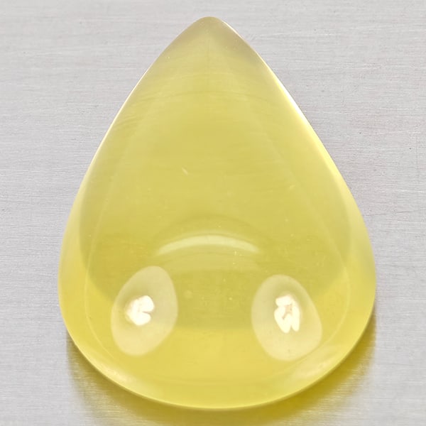Natural Yellow Lemon Quartz Gemstones 19.21 Ct. Pear Cabochon Shape 23 x 16 Mm.: Product ID: 805530058 Product Name: Natural Quartz Weight: 19.21 CT. Size: 23 x 16 x 8.6 MM. Shape: Pear Cabochon Color: Yellow Clarity:None Luster: Good Gems Origin: Brazil Treatment: Unheated Crysta