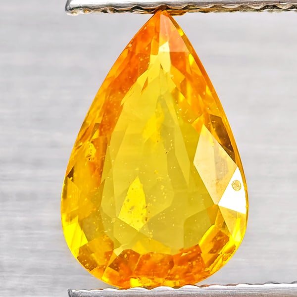 Natural Yellow Sapphire Gemstones 1.23 Ct. Pare Shape 9 x 6 Mm.: Product ID: 806162682 Product Name: Natural Yellow Sapphire Weight: 1.23 CT. Size: 9 x 6 x 2.6 MM. Shape: Pear Shape Color: Yellow Clarity:VSI Luster: Good Gems Origin: Thailand Treatment: Heated Crys