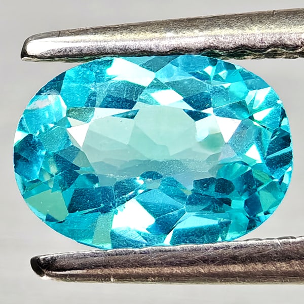 Natural Paraiba Color Apatite Gemstones 0.84 Ct. Oval Shape 7.3 x 5.3 Mm.: Product ID: 800613706 Product Name: Natural Apatite Weight: 0.84 CT. Size: 7.3 x 5.3 x 3.2 MM. Shape: Oval Color: Neon Blue Clarity:VSI Luster: Good Gems Origin: Tanzania Treatment: Unheated Crystal S