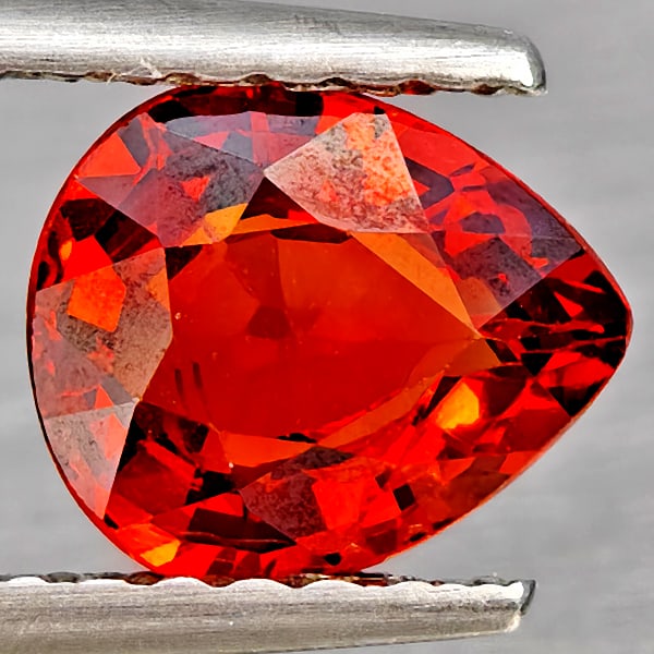 Natural Orangish Red Spessartine Garnet Gemstones 0.97 Ct. Pear Shape 6.8 x 5.7 Mm.: Product ID: 802937228 Product Name: Natural Garnet Weight: 0.97 CT. Size: 6.8 x 5.7 x 3 MM. Shape: Pear Shape Color: Orangish Red Clarity:VSI Luster: Good Gems Origin: Namibia Treatment: Unheated Crys