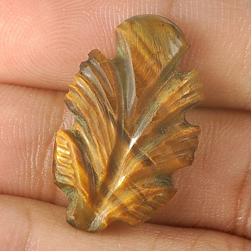 Natural Golden Tiger Eye Gemstones 8.74 Ct. Carving Leaves Shape 22 x 4 Mm.: Product ID: 811600034 Product Name: Natural Tiger eye Weight: 8.74 CT. Size: 22 x 4 x 4 MM. Shape: Carving Leaves Color: Golden Clarity:Opaque Luster: Good Gems Origin: Thailand Treatment: Unheated Cr