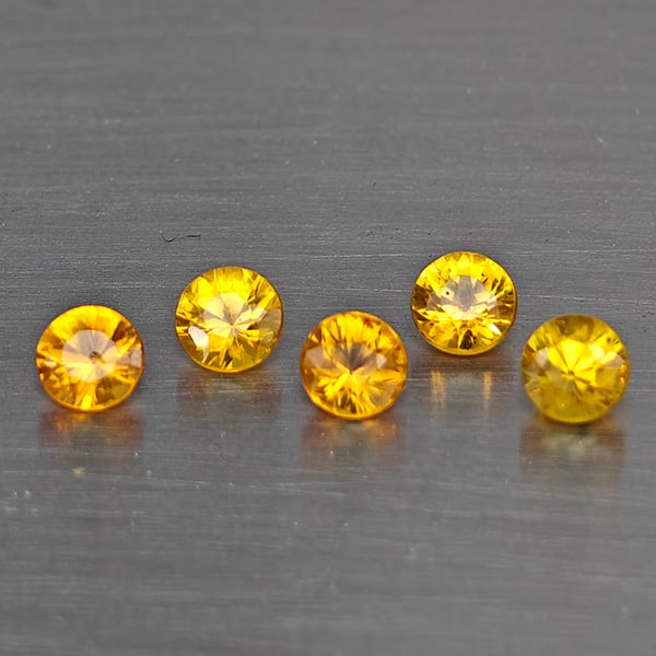 Natural Yellow Songea Sapphire Gemstones 0.92 Ct. 5 Pcs. Round Diamond Cut 3.3 Mm.: Product ID: 806130487 Product Name: Natural Blue Sapphire Weight: 0.92 CT. Size: 3.3 x 3.3 x 2.5 MM. Shape: Round Diamond Cut Color: Yellow Clarity:SI1 Luster: Good Gems Origin: Tanzania Treatment: He