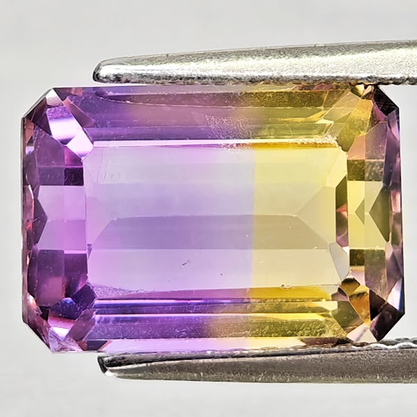Natural Bi Color Ametrine Gemstones 3.77 Ct. Octagon Shape 10.9 x 7.6 Mm.: Product ID: 800408282 Product Name: Natural Ametrine Weight: 3.77 CT. Size: 10.9 x 7.6 x 5.8 MM. Shape: Octagon Color: Bi Color Clarity:VSI Luster: Good Gems Origin: Bolivia Treatment: Unheated Crysta