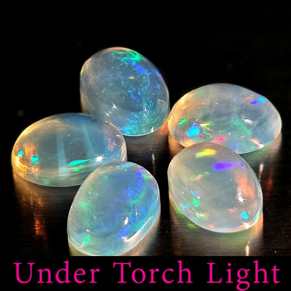 Natural Multi Color Opal Gemstones 1.65 Ct. 5 Pcs. Oval Cabochon Shape 6 x 4.2 Mm.: Product ID: 818728086 Product Name: Natural Opal Weight: 1.65 CT. Size: 6 x 4.2 x 2.6 MM. Shape: Oval Cabochon Color: Multi-Color Clarity:Semi - Transparent Luster: Good Gems Origin: Ethiopia Treatmen