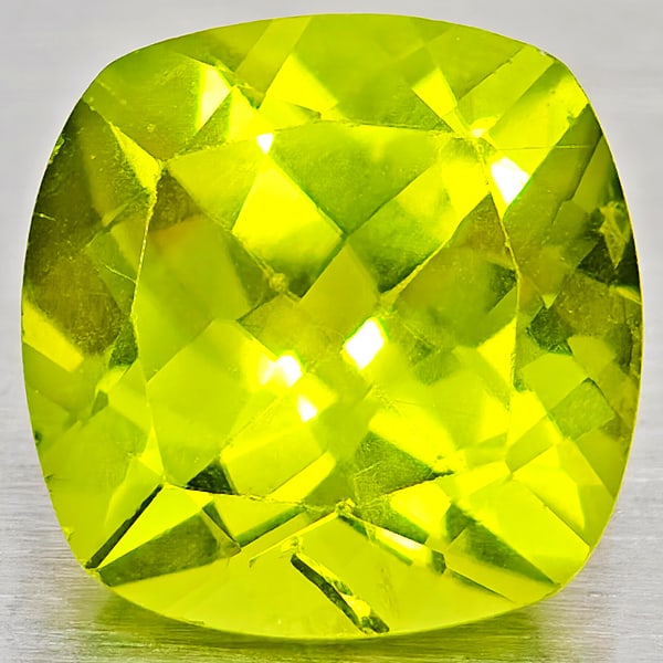 Natural Green Peridot Gemstones 1.58 Ct. Cushion Shape 7.1 Mm.: Product ID: 805317253 Product Name: Natural Peridot Weight: 1.58 CT. Size: 7.1 x 7.1 x 4.6 MM. Shape: Cushion Shape Color: Green Clarity:VSI - SI1 Luster: Good Gems Origin: Pakistan Treatment: Unheate