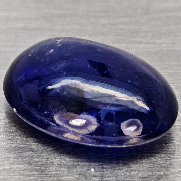 Natural Blue Sapphire Gemstones 4.07 Ct. Oval Cabochon Shape 10.7 x 8 Mm.: Product ID: 806012354 Product Name: Natural Blue Sapphire Weight: 4.07 CT. Size: 10.7 x 8 x 4.6 MM. Shape: Oval Cabochon Color: Blue Clarity:Semi - Transparent Luster: Good Gems Origin: Madagascar Tre