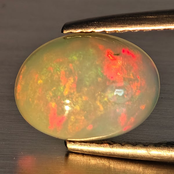 Natural Multi-Color Play Of Colour Opal Gemstone 1.76 Ct. Oval Cabochon Shape 10.5 x 7.9 Mm. (1 of 3)