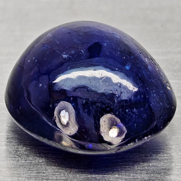Natural Blue Sapphire Gemstones 5.12 Ct. Oval Cabochon Shape 9.8 x 9.1 Mm.: Product ID: 806012351 Product Name: Natural Blue Sapphire Weight: 5.12 CT. Size: 9.8 x 9.1 x 6 MM. Shape: Oval Cabochon Color: Blue Clarity:Semi - Transparent Luster: Good Gems Origin: Madagascar Trea