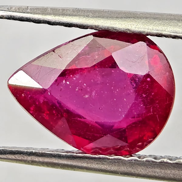Natural Natural Purplish Red Ruby Gemstones 2.20 Ct. Pear Shape 9.3 x 7.2 Mm.: Product ID: 805935585 Product Name: Natural Ruby Weight: 2.20 CT. Size: 9.3 x 7.2 x 4.1 MM. Shape: Pear Shape Color: Purplish Pink Clarity:VSI - SI1 Luster: Good Gems Origin: Madagascar Treatment: Hea