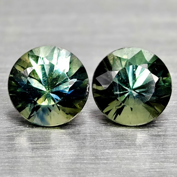 Natural Fancy Color Sapphire Gemstones 0.57 Ct. 2 Pcs. Round Diamand Cut 3.8 Mm.: Product ID: 806162221 Product Name: Natural Green Sapphire Weight: 0.57 CT. Size: 3.8 x 3.8 x 2.8 MM. Shape: Round Diamond Cut Color: Fancy Color Clarity:VSI Luster: Very Good Gems Origin: Tanzania Tr