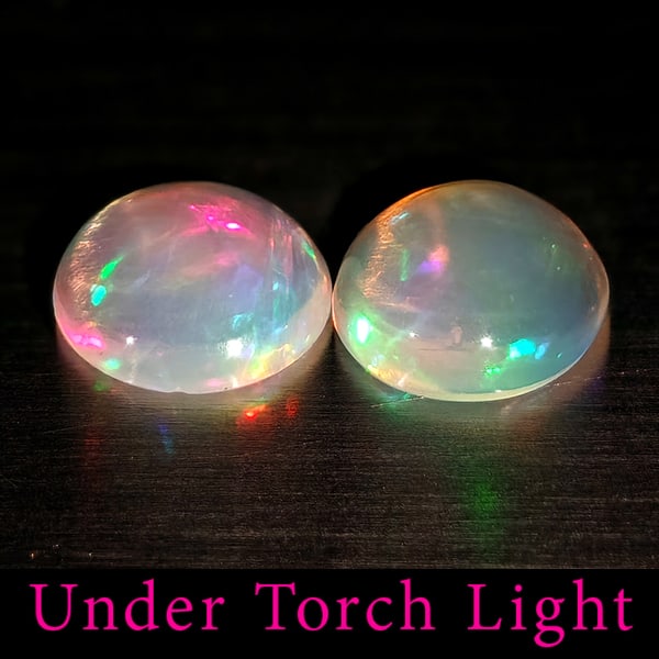 Natural Multi Color Opal Gemstones 1.07 Ct. 2 Pcs. Round Cabochon Shape 6.8 Mm.: Product ID: 818728207 Product Name: Natural Opal Weight: 1.07 CT. Size: 6.8 x 6.8 x 2.8 MM. Shape: Round Cabochon Color: Multi-Color Clarity:Semi - Transparent Luster: Good Gems Origin: Ethiopia Treat