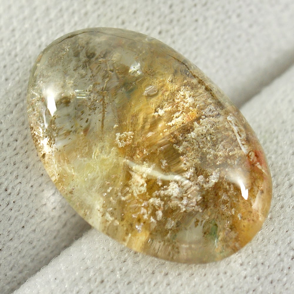 Natural Multi-Color Moss Quartz Gemstones 9.31 Ct. Oval Shape Cabochon 17 x 11.7 Mm.: Product ID: 805529638 Product Name: Natural Quartz Weight: 9.31 CT. Size: 17 x 11.7 x 7.5 MM. Shape: Oval Cabochon Color: Multi-Color Clarity:Semi - Transparent Luster: Good Gems Origin: Thailand Trea