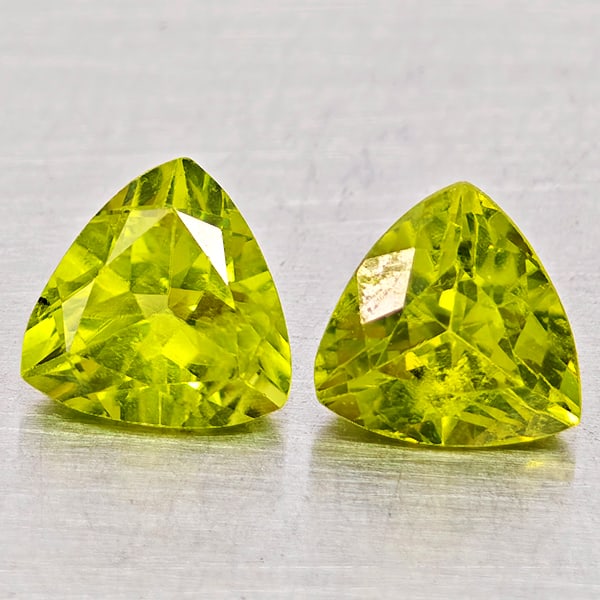 Natural Green Peridot Gemstones 1.69 Ct. 2 Pcs. Trilliant Shape 6 Mm.: Product ID: 805317534 Product Name: Natural Peridot Weight: 1.69 CT. Size: 6 x 6 x 4.1 MM. Shape: Trilliant Color: Green Clarity:SI1 Luster: Good Gems Origin: Pakistan Treatment: Unheated Crystal Stru