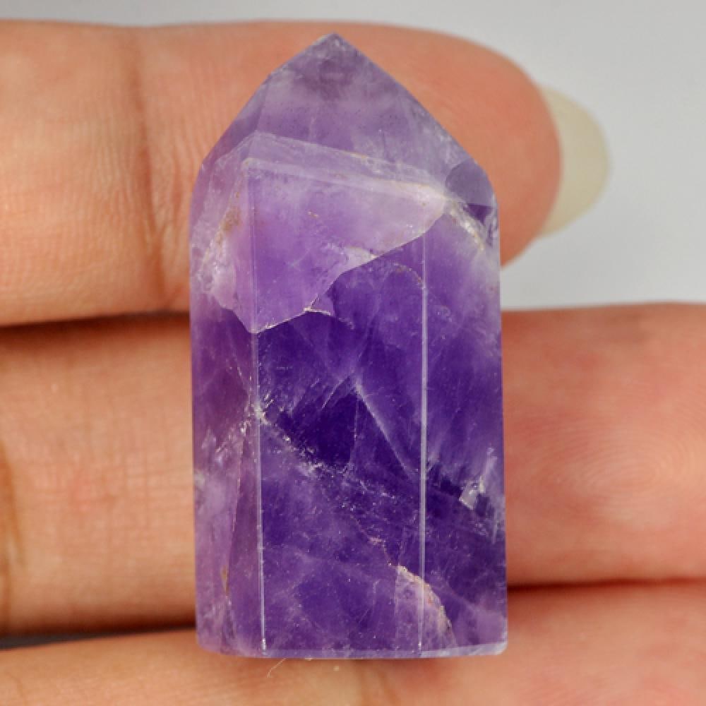 Natural Purple Amethyst Gemstones Rough 70.85 Ct.: Product ID: 818300518 Product Name: Natural Rough Weight: 70.85 CT. Size: 32 x 12 x 11 MM. Shape: Rough Color: Purple Clarity:Opaque Luster: Good Gems Origin: Brazil Treatment: Unheated Crystal Struct