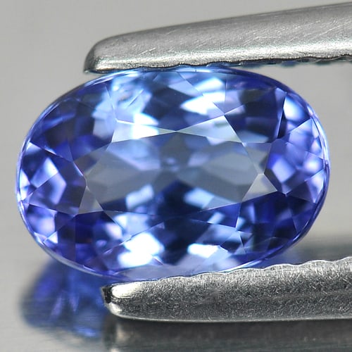 Natural Blue Tanzanite Gemstones 1.09 Ct. Oval Shape 7.37 x 5.07 Mm.: Product ID: 807005769 Product Name: Natural Tanzanite Weight: 1.09 CT. Size: 7.37 x 5.07 x 3.80 MM. Shape: Oval Color: Blue Clarity:VSI Luster: Good Gems Origin: Tanzania Treatment: Heated Crystal Str