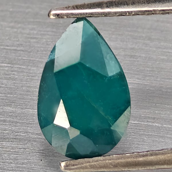 Natural Green Blueish Grandidierite Gemstones 1.25 Ct. Pear Shape 8.3 x 5.6 Mm.: Product ID: 803100092 Product Name: Natural Tsavorite Weight: 1.25 CT. Size: 8.3 x 5.6 x 4.3 MM. Shape: Pear Color: Green Blueish Clarity:SI1 Luster: Good Gems Origin: Madagascar Treatment: Unheated C