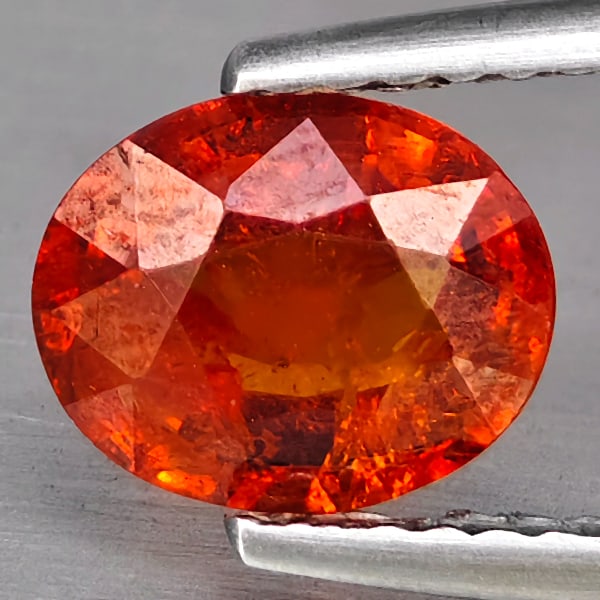 Natural Orangish Red Spessartine Garnet Gemstones 1.75 Ct. Oval Shape 7.8 x 6.6 Mm.: Product ID: 802937952 Product Name: Natural Garnet Weight: 1.75 CT. Size: 7.8 x 6.6 x 4 MM. Shape: Oval Color: Orangish Red Clarity:SI1 Luster: Good Gems Origin: Namibia Treatment: Unheated Crystal St