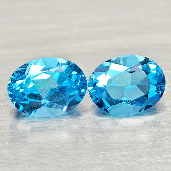 Natural Swiss Blue Topaz Gemstones 3.38 Ct. 2 Pcs. Round Shape 8.1 x 6.1 Mm.: Product ID: 807168110 Product Name: Natural Blue Topaz Weight: 3.38 CT. Size: 8.1 x 6.1 x 4.6 MM. Shape: Round Shape Color: Swiss Blue Clarity:VSI Luster: Good Gems Origin: Brazil Treatment: Treated C