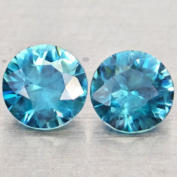 Natural Blue Zircon Gemstones 1.31 Ct. 2 Pcs. Round Diamond Cut 5.1 Mm.: Product ID: 807743036 Product Name: Natural Zircon Weight: 1.31 CT. Size: 5.1 x 5.1 x 3.2 MM. Shape: Round Diamond Cut Color: Blue Clarity:VSI Luster: Good Gems Origin: Cambodia Treatment: Heated Crys