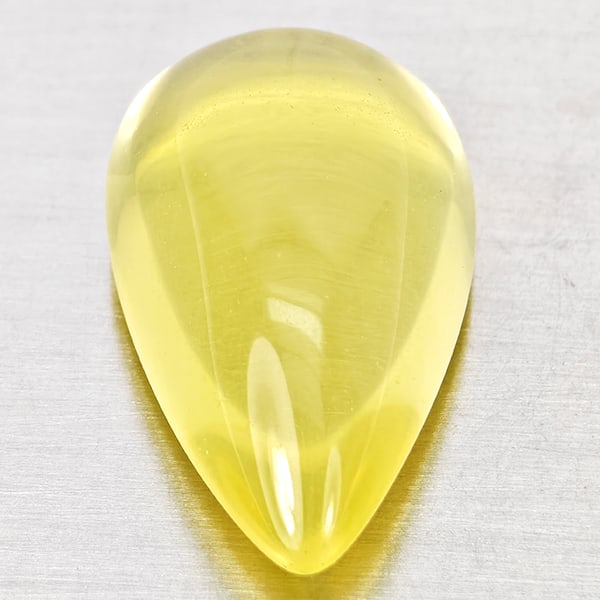 Natural Yellow Lemon Quartz Gemstones 14.83 Ct. Pear Cabochon Shape 21 x 12.9 Mm.: Product ID: 805530054 Product Name: Natural Quartz Weight: 14.83 CT. Size: 21 x 12.9 x 8.6 MM. Shape: Pear Cabochon Color: Yellow Clarity:None Luster: Good Gems Origin: Brazil Treatment: Unheated Crys