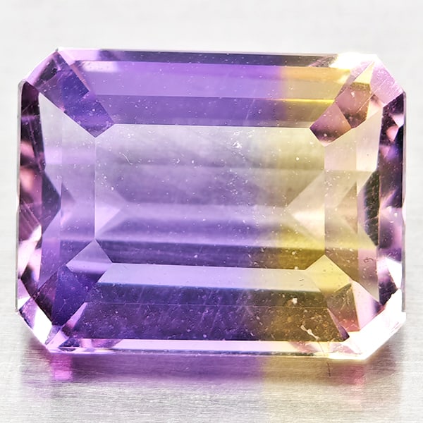 Natural Bi Color Ametrine Gemstones 2.75 Ct. Octagon Shape 9.3 x 7.3 Mm.: Product ID: 800408509 Product Name: Natural Ametrine Weight: 2.75 CT. Size: 9.3 x 7.3 x 5.3 MM. Shape: Octagon Color: Bi Color Clarity:VSI Luster: Good Gems Origin: Bolivia Treatment: Unheated Crystal