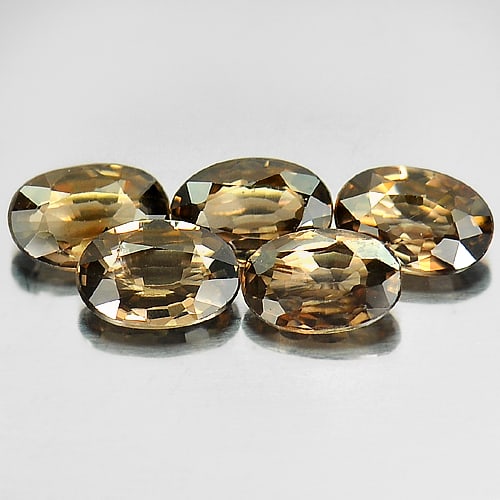 Natural Imperial Zircon Gemstones 3.25 Ct. 5 Pcs. Oval Shape 6.3 x 4.3 Mm.: Product ID: 807726644 Product Name: Natural Zircon Weight: 3.25 CT. Size: 6.3 x 4.3 x 2.1 MM. Shape: Oval Color: Imperial Clarity:VSI Luster: Good Gems Origin: Cambodia Treatment: Heated Crystal Struc