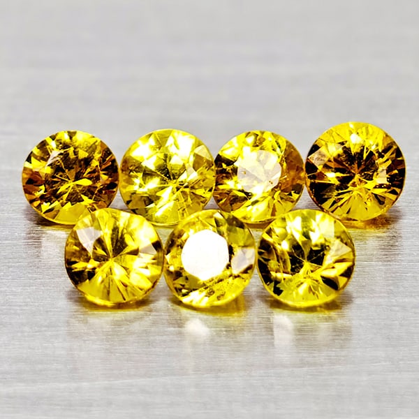 Natural Yellow Sapphire Gemstones 0.95 Ct. 7 Pcs. Round Diamond Cut 3 Mm.: Product ID: 806162316 Product Name: Natural Yellow Sapphire Weight: 0.95 CT. Size: 3 x 3 x 2 MM. Shape: Round Diamond Cut Color: Yellow Clarity:VSI - SI1 Luster: Good Gems Origin: Thailand Treatment: 