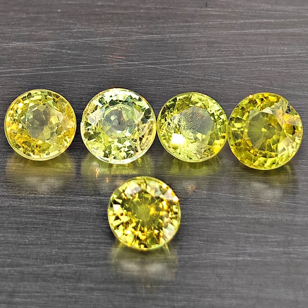 Natural Greenish Yellow Titanium Sphene Gemstones Rainbow Spark 1.97 Ct. 5 Pcs. Round Shape 4 Mm.: Product ID: 806509387 Product Name: Natural Sphene Weight: 1.97 CT. Size: 4 x 4 x 2.9 MM. Shape: Round Color: Greenish Yellow Clarity:SI1 Luster: Good Gems Origin: Madagascar Treatment: Unheated Cryst