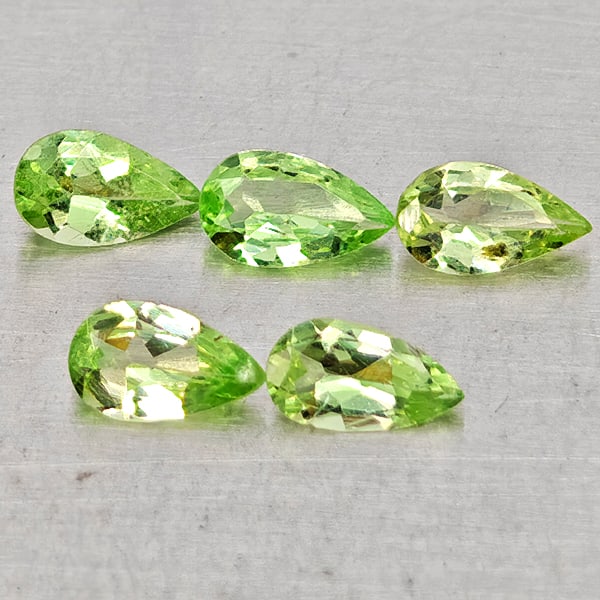 Natural Green Tsavorite Garnet Gemstones 0.87 Ct. 5 Pcs. Pear Shape 5 x 3 Mm.: Product ID: 803005096 Product Name: Natural Tsavorite Weight: 0.87 CT. Size: 5 x 3 x 1.8 MM. Shape: Pear Shape Color: Green Clarity:SI Luster: Good Gems Origin: Tanzania Treatment: Unheated Crystal St