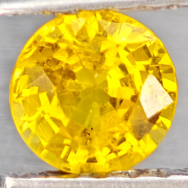 Natural Yellow Sapphire Gemstones 0.47 Ct. Round Shape 4.6 Mm.: Product ID: 806162953 Product Name: Natural Yellow Sapphire Weight: 0.47 CT. Size: 4.6 x 4.6 x 2.8 MM. Shape: Round Shape Color: Yellow Clarity:VSI Luster: Good Gems Origin: Thailand Treatment: Heated