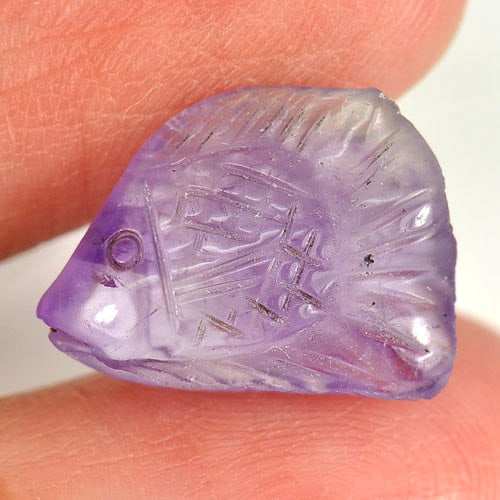 Natural Violet Amethyst Gemstones 5.56 Ct. Fish Carving Shape 15.3 x 11.2 Mm.: Product ID: 810303228 Product Name: Natural Amethyst Weight: 5.56 CT. Size: 15.3 x 11.2 x 5.7 MM. Shape: Fish Carving Color: Violet Clarity:Semi - Transparent Luster: Good Gems Origin: Brazil Treatmen