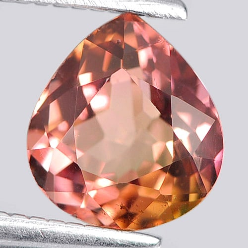 Natural Bi Color Tourmaline Gemstones 0.94 Ct. Pear Shape 7 x 6.3 Mm.: Product ID: 807249197 Product Name: Natural Tourmaline Weight: 0.94 CT. Size: 7 x 6.3 x 3.6 MM. Shape: Pear Color: Bi Color Clarity:VSI Luster: Good Gems Origin: Nigeria Treatment: Unheated Crystal St