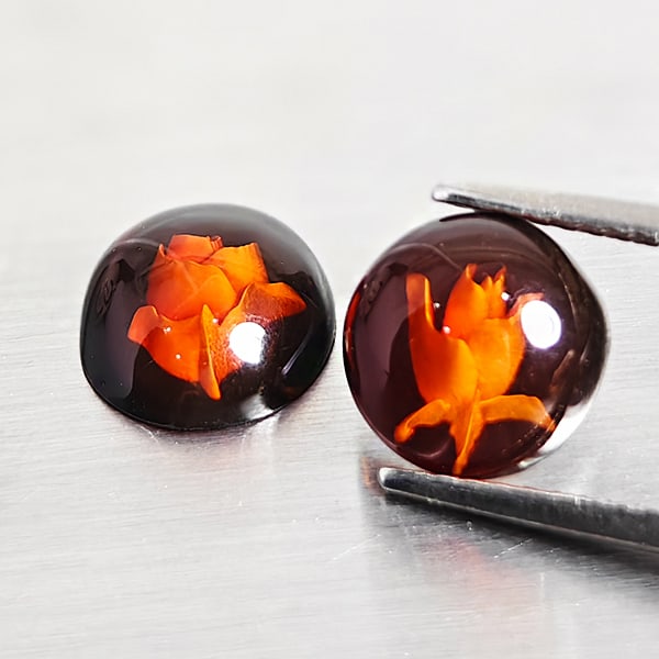 Natural Brown Yellow Amber Gemstones 1.19 Ct. 2 Pcs. Flower Carving In Shape 7.8 x 7.7 Mm.: Product ID: 819090995 Product Name: Natural Amber Weight: 1.19 CT. Size: 7.8 x 7.7 x 3.3 MM. Shape: Oval Cabochon Color: Brown Yellow Clarity:Semi - Transparent Luster: Good Gems Origin: Poland Treatm