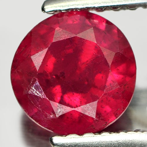 Natural Purplish Red Red Ruby Gemstones 1.21 Ct. Round Shape 6.4 Mm.: Product ID: 805933484 Product Name: Natural Ruby Weight: 1.21 CT. Size: 6.4 x 6.4 x 3.5 MM. Shape: Round Color: Purplish Red Clarity:SI1 Luster: Good Gems Origin: Madagascar Treatment: Heated (Lead-gl