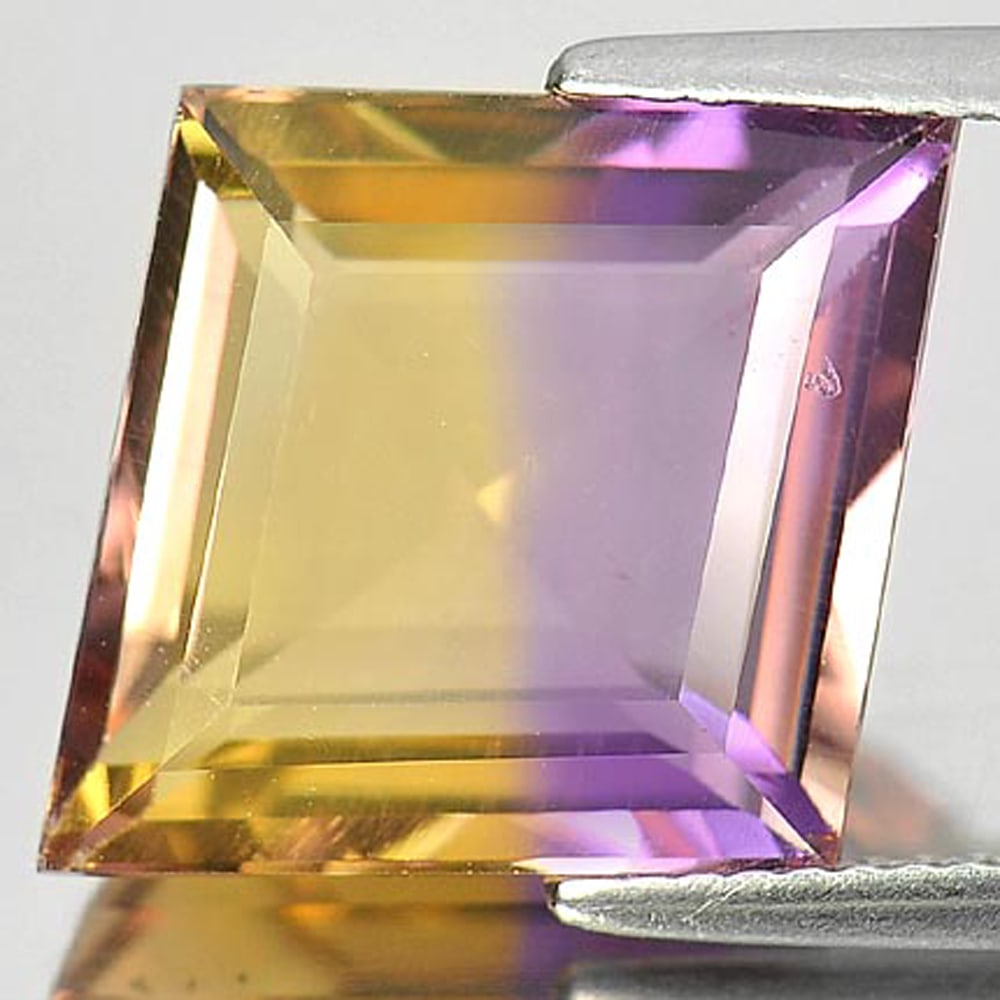 Natural Bi Color Ametrine Gemstones 8.74 Ct. Fancy Shape 12.5 x 12.5 Mm.: Product ID: 800407409 Product Name: Natural Ametrine Weight: 8.74 CT. Size: 12.5 x 12.5 x 7 MM. Shape: Fancy Color: Bi-Color Clarity:VSI Luster: Good Gems Origin: Bolivia Treatment: Unheated Crystal S