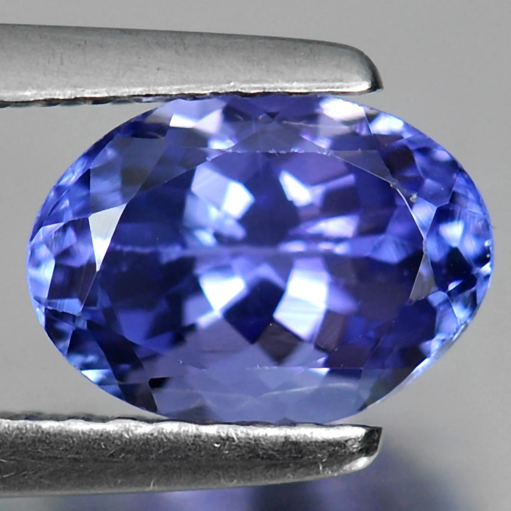 Natural Violetish Blue Tanzanite Gemstones 1.36 Ct. Oval Shape 7.9 x 5.8 Mm.: Product ID: 807009008 Product Name: Natural Tanzanite Weight: 1.36 CT. Size: 7.9 x 5.8 x 4.3 MM. Shape: Oval Color: Violetish Blue Clarity:VSI Luster: Good Gems Origin: Tanzania Treatment: Heated Crys