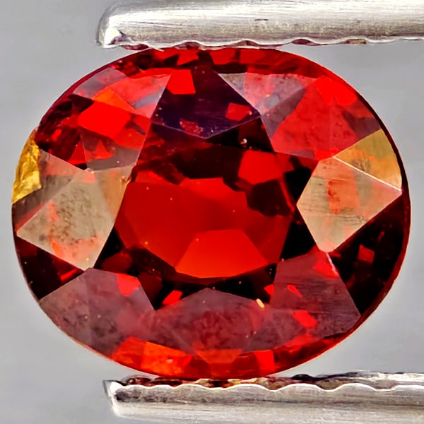 Natural Orangish Red Spessartine Garnet Gemstones 0.98 Ct. Oval Shape 6.3 x 5.5 Mm.: Product ID: 802937309 Product Name: Natural Garnet Weight: 0.98 CT. Size: 6.3 x 5.5 x 3.4 MM. Shape: Oval Shape Color: Orangish Red Clarity:SI1 Luster: Good Gems Origin: Namibia Treatment: Unheated Cr