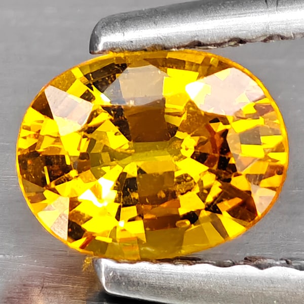Natural Yellow Sapphire Gemstones 0.66 Ct. Oval Shape 6 x 4.6 Mm.: Product ID: 806163022 Product Name: Natural Yellow Sapphire Weight: 0.66 CT. Size: 6 x 4.6 x 3.3 MM. Shape: Oval Color: Yellow Clarity:SI1 Luster: Good Gems Origin: Thailand Treatment: Heated Crystal 