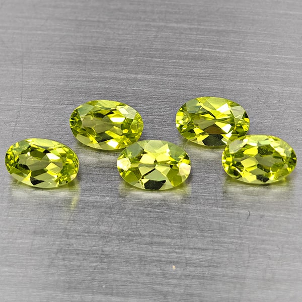 Natural Green Peridot Gemstones 2.91 Ct. 5 Pcs. Oval Shape 6.2 x 4.2 Mm.: Product ID: 805317767 Product Name: Natural Peridot Weight: 2.91 CT. Size: 6.2 x 4.2 x 3.4 MM. Shape: Oval Shape Color: Green Clarity:VSI Luster: Good Gems Origin: Pakistan Treatment: Unheated Crystal