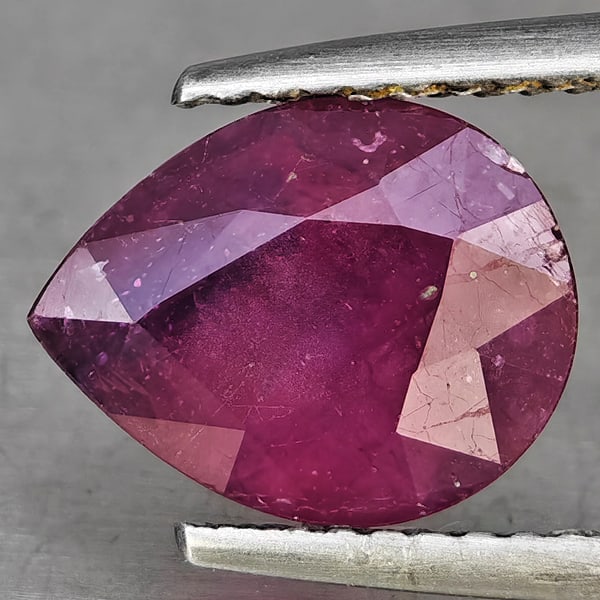 Natural Purplish Red Ruby Gemstones 3.43 Ct. Pear Shape 10.2 x 8.2 Mm.: Product ID: 805935903 Product Name: Natural Ruby Weight: 3.43 CT. Size: 10.2 x 8.2 x 5.2 MM. Shape: Pear Shape Color: Purplish Red Clarity:SI1 Luster: Good Gems Origin: Madagascar Treatment: Heated (L